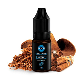 Líquido de sales de nicotina Montreal Chance 10ml, botella con diseño en tonos oscuros, acompañado de hojas de tabaco que representan su sabor suave y equilibrado.